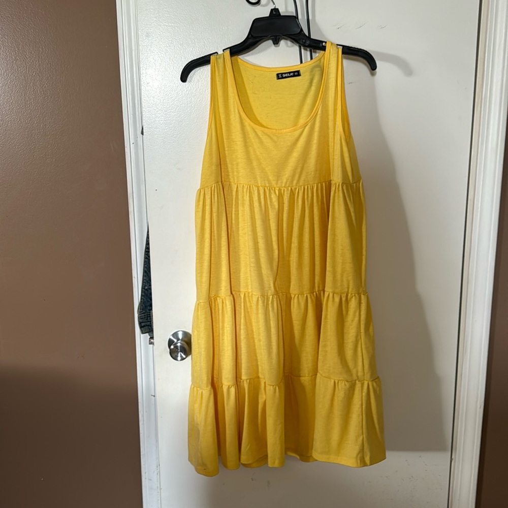 Yellow tiered midi dress.